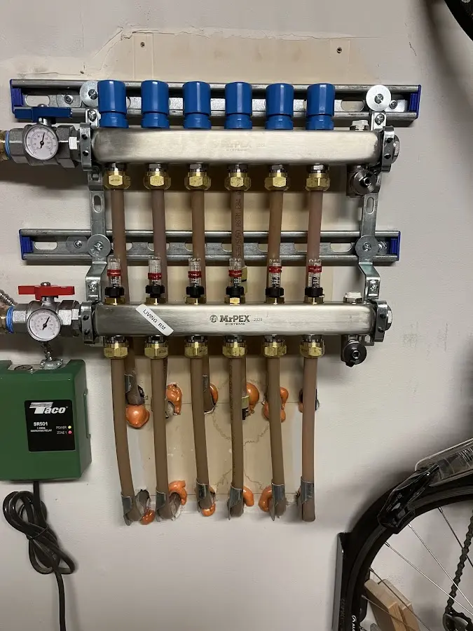 Plumber performing Gas Line Installation at a residential property in Mine Hill